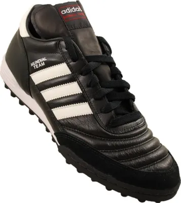 A black Adidas soccer shoe with white stripes and red accents.