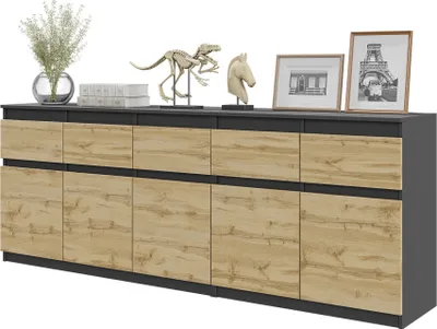 A modern sideboard with a dark gray top and frame, and light wood-effect doors and drawers. It is decorated with various objects on top.