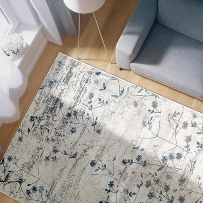 Productafbeelding van Laagpolig woonkamertapijt met blauw bloemenmotief in vintage stijl, 80 x 150 cm