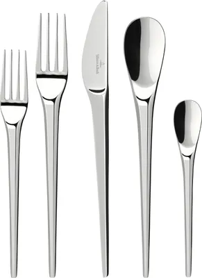 A set of five polished metal cutlery pieces arranged vertically against a white background.