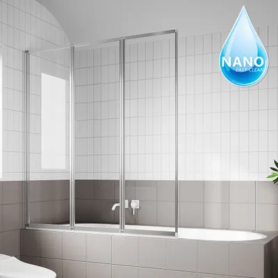A bathroom scene with a bathtub and a shower screen.
