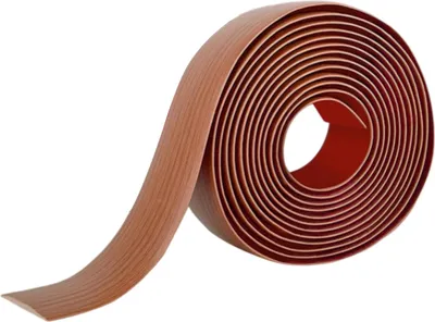 A roll of brown tape with a wood grain texture, isolated on a white background.