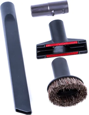 A set of vacuum cleaner attachments on a white background.