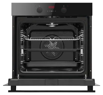 An open black oven with shelves and a baking tray inside.