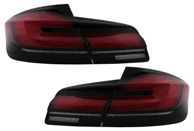 Immagine prodotto di Fari posteriori a LED per BMW Serie 5 F10, design LCI G30, rosso e nero, con indicatori di direzione dinamici.