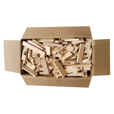 A cardboard box filled with pieces of firewood.