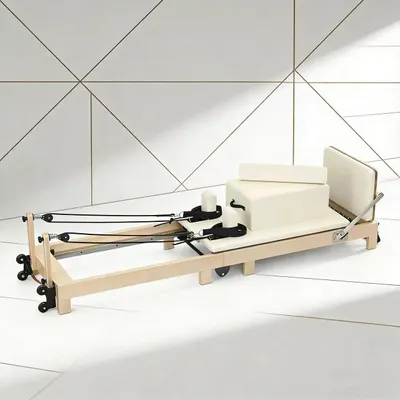 Zdjęcie produktu dla Reformer do pilatesu – składane urządzenie z drewna klonowego – regulowany opór – skórapoliuretan – nośność 250 kg – do ćwiczeń w domu – biały
