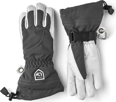 Skihandschuhe "Heli Ski Female - 5 finger" von Hestra in Grau mit elastischem Bündchen und verstellbarem Verschluss.