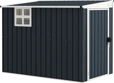 A dark gray metal garden shed with a white trim and a small window on the left side and a door on the right side.