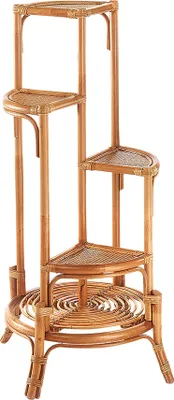 A multi-tiered rattan plant stand against a white background.