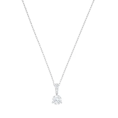 A diamond pendant necklace on a white background.