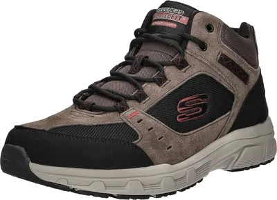 A single brown and black mid-top shoe is shown from a diagonal angle against a white background.
