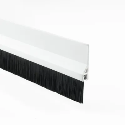 A close-up studio shot of a white door bottom seal with black bristles, isolated on a white background.