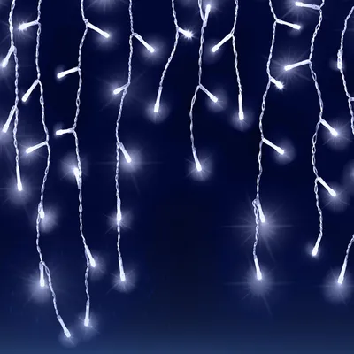 Icicle lights hanging against a dark blue background.