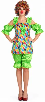 Damen Clown Kostüm Betty mit buntem Harlekin-Oberteil, grünen Rüschenärmeln, grüner Kniebundhose und Clownsperücke.