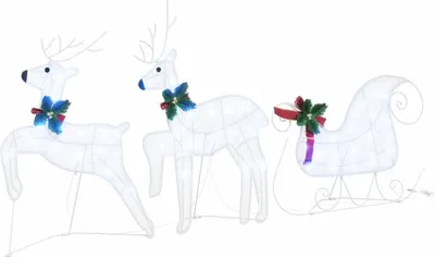 Three white LED reindeer and a sleigh decorated with bows and holly for Christmas.