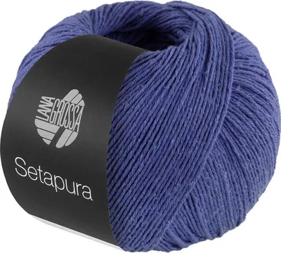 A ball of blue yarn with a black label.