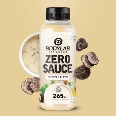 A bottle of BODYLAB Zero Sauce - Truffle Mayo Flavouring, surrounded by truffles and a bowl of sauce.