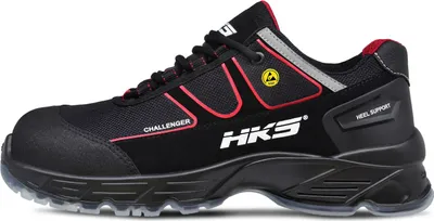 A side view of a black HKS safety shoe with red accents.