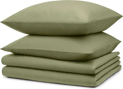 A stack of folded bedding and pillows.