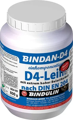 A white plastic container of adhesive with blue and red labeling.