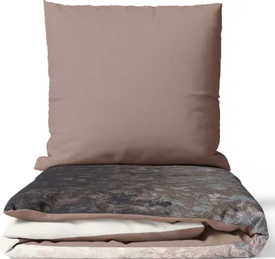 A stack of bedding, including a pillow and duvet, with a patterned design.