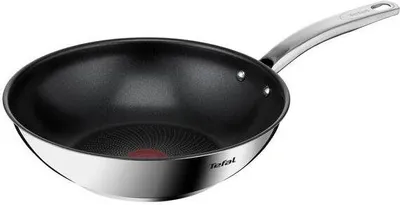 A studio shot of a wok on a white background.
