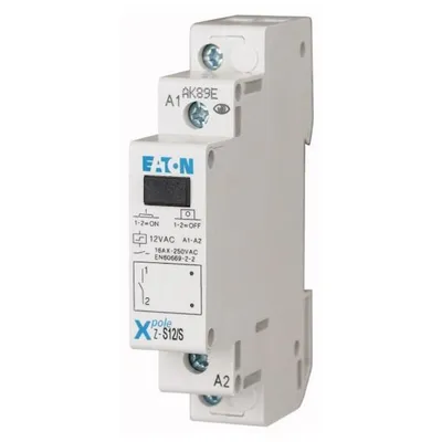 A white Eaton relay device with a small black display and blue branding.