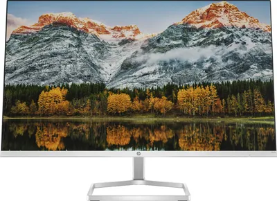 A computer monitor displaying a scenic landscape image.