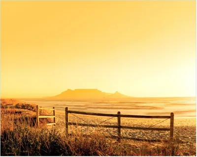 Produktbild von Wallario Poster - Strand in Südafrika I - Himmel in orange, Kunstdruck Größe: 40 x 50 cm