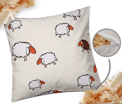 A pillow with a sheep pattern and a close-up of the zipper and filling.