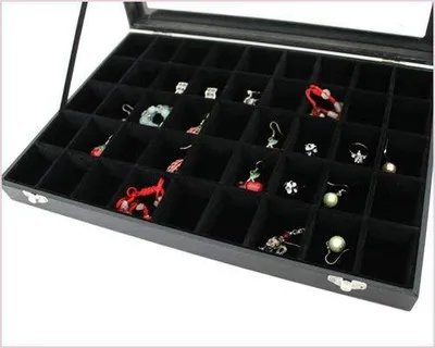 Immagine prodotto di Portagioie, cassettiera per gioielli, vetrina, espositore per gioielli con coperchio in vetro e 45 scomparti, nero