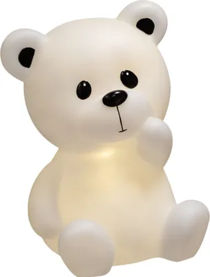 A white teddy bear lamp sits on a white background.