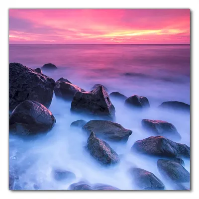Produktbild von Wallario selbstklebende Möbelfolie/ Tischdecke für Innen und Außen, Größe: 70 x 70 cm - Felsen im Meer bei Sonnenuntergang