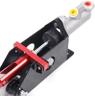 A close-up view of a hydraulic gaming handbrake, showcasing its mechanical components and adjustable features.
