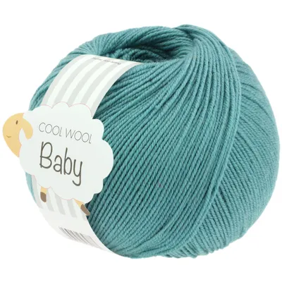 A ball of teal yarn with a label attached.