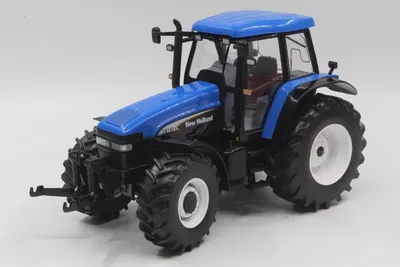 Produktbild von New Holland Tm140, Rep242, Maßstab1/32, Replicagri