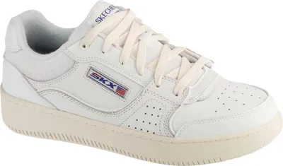 A white low-top sneaker with cream laces and sole.