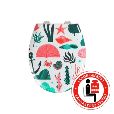 A toilet seat with a marine-themed pattern, featuring shells, coral, and sea creatures, on a white background. A circular badge with text and icons is present in the lower right corner.