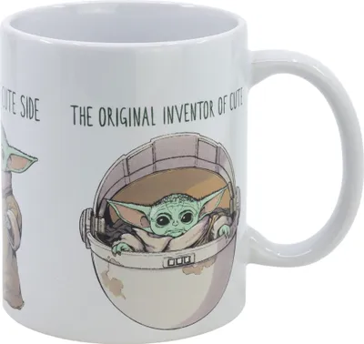 A white ceramic mug with an illustration of Baby Yoda from Star Wars and text.
