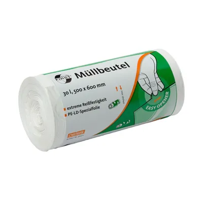 A roll of white trash bags with green and orange branding.