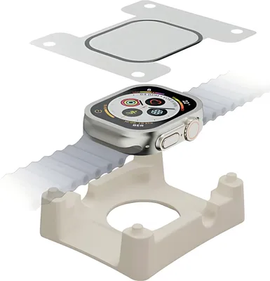 An Apple Watch Ultra with a screen protector and a charging stand.