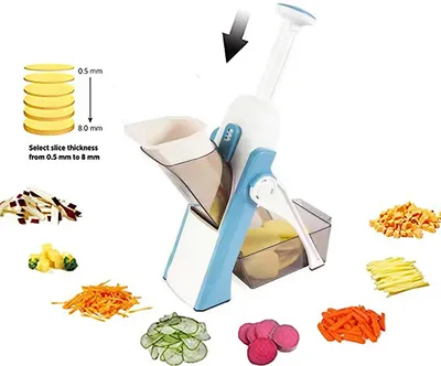 A multifunctional vegetable slicer is shown with various chopped vegetables surrounding it.
