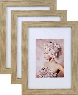 Three wooden picture frames are displayed, with the front frame showcasing a woman adorned with flowers.