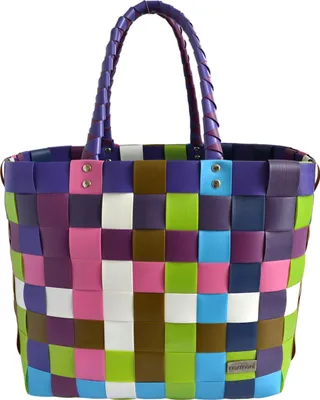 A colorful woven shopping basket.