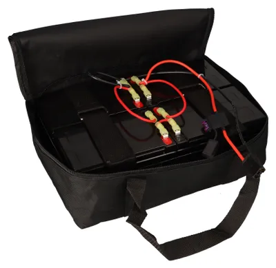 A black bag containing a battery pack with red and yellow wires.