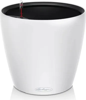 A white planter pot with a black interior and a water level indicator.