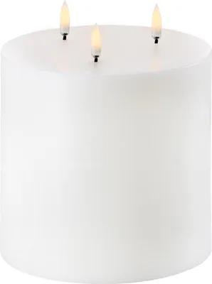 A white LED pillar candle with three flames.