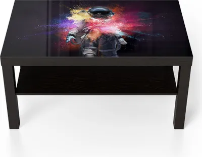Produktbild von DEQORI Couchtisch 90x55 cm Schwarz 'Kosmonaut in Farbknall' Glas Beistelltisch