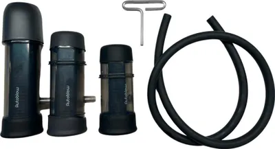 Three black cylindrical objects of varying sizes, a metal tool, and a black hose are arranged on a white background.